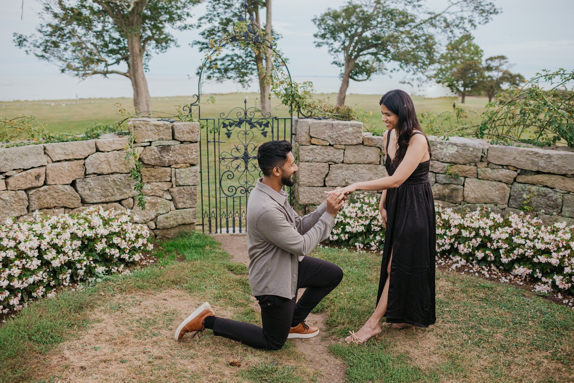 Candid engagement laughter in soft afternoon light