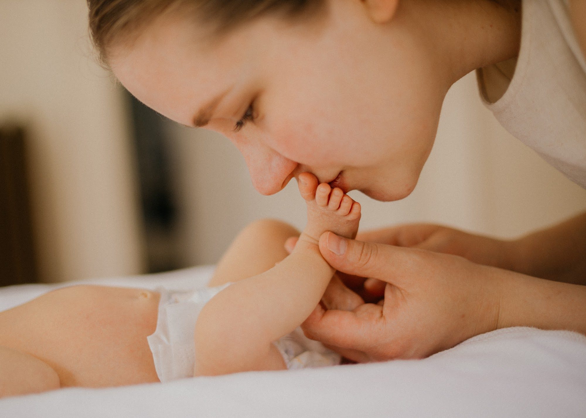 Peaceful newborn portrait in gentle natural light
