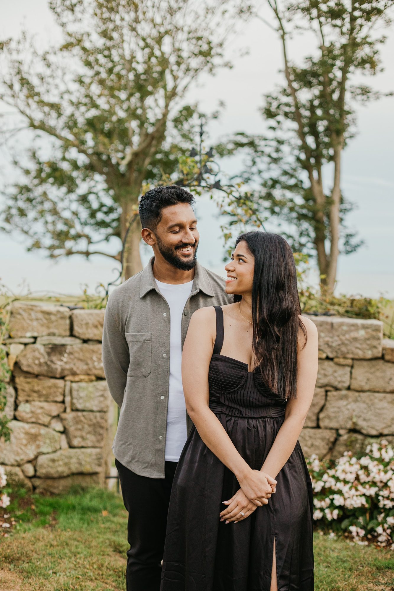Couple holding hands during engagement session