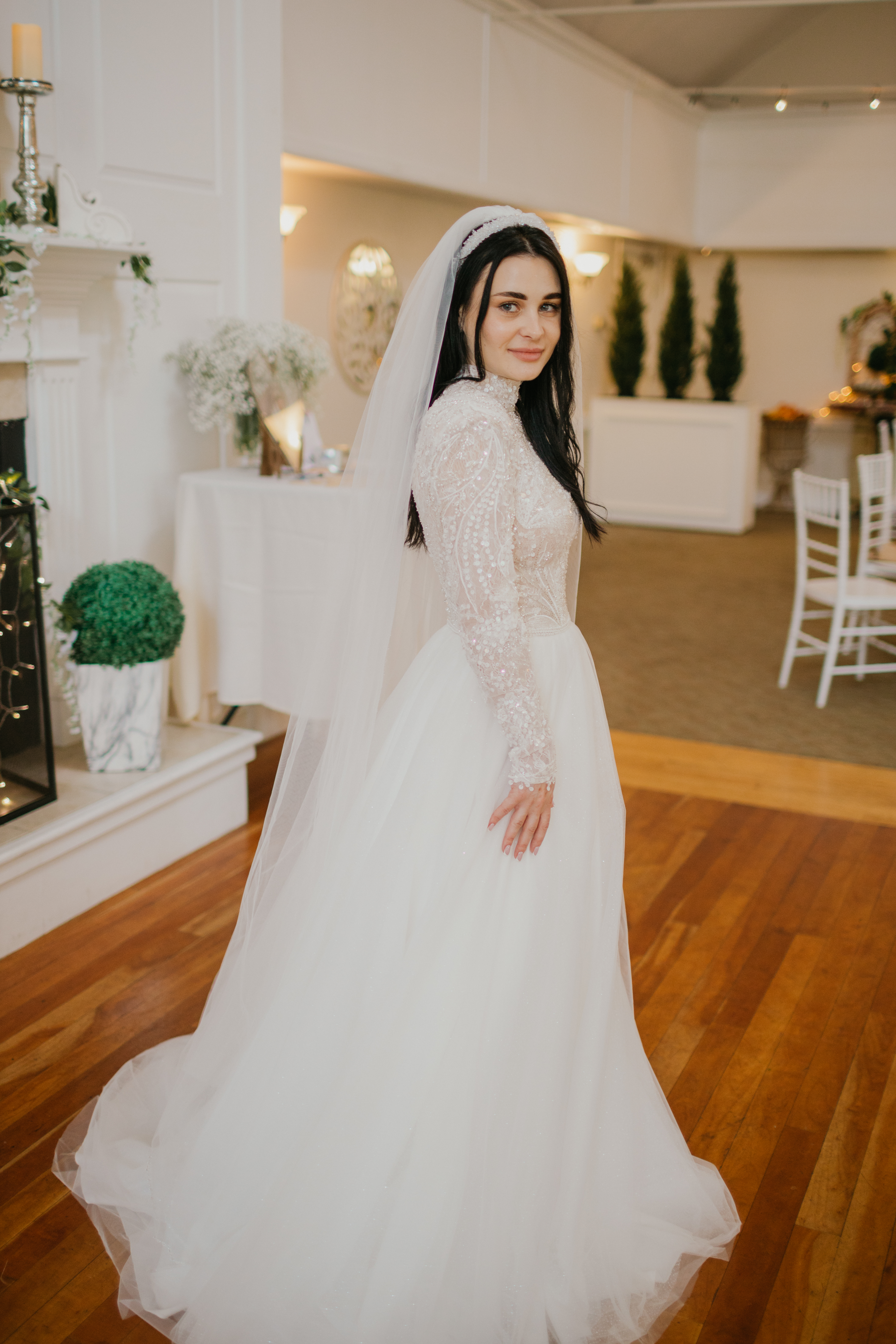Editorial bridal portrait in evergreen light